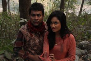 Rudranil Ghosh and Tridha Choudhury in Khaad (2014)