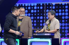 Rez Cortez, Dingdong Dantes, and Leo Martinez in Family Feud Philippines (2022)