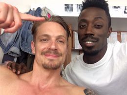Joel Kinnaman & Edwin De La Renta on set of The Informer