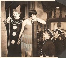 Harry Cording, Fifi D'Orsay, Hans Fuerberg, Walter McGrail, and J. Harold Murray in Women Everywhere (1930)