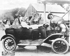 Oliver Hardy, Jimmy Aubrey, Rosa Gore, and Leila McCarthy in The Nuisance (1921)
