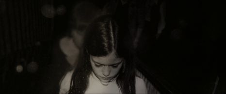 Mackenzie Foy and Nate Seman in The Conjuring (2013)