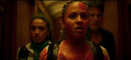 Tim Rozon, Robyn Alomar, and Nadine Bhabha in Terror Train (2022)