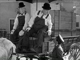 Oliver Hardy, Charlie Hall, and Stan Laurel in The Music Box (1932)