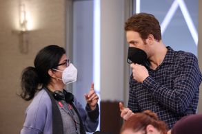Still of Afia Nathaniel and Nick Gehlfuss on the set of Chicago Med