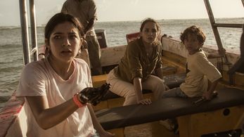 Carlos Solórzano, Fernanda Urrejola, and Venus Ariel in The Black Demon (2023)