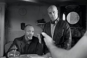 With Paul Calderon in 