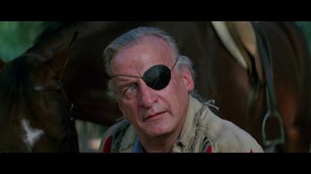 George C. Scott in Firestarter (1984)