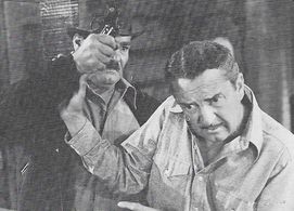 Harry Cording and Bryant Washburn in King of the Royal Mounted (1940)