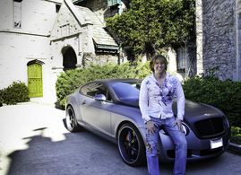 Michael Blakey at the Playboy Mansion with his new toy.