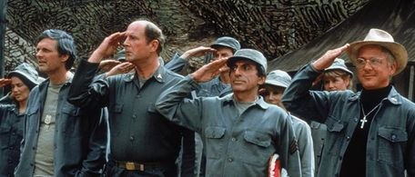 Alan Alda, David Ogden Stiers, William Christopher, and Jamie Farr in M*A*S*H (1972)