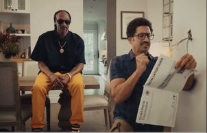 Snoop Dogg and Justin Wade on the set of 