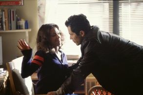 John Leguizamo and Delilah Cotto in Empire (2002)