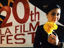 at LAFF holding Grand Prix flower