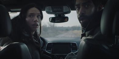 Rahul Kohli and Katie Parker in Next Exit (2022)