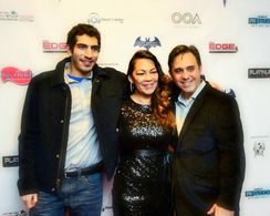 Tom on the red carpet premiere of Caped Crusader: The Dark Hours film with director Ramsey Eassa and producer Lisa Wynn.