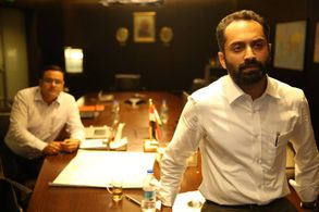 Satish Sharma and Fahadh Faasil in Take Off (2017)