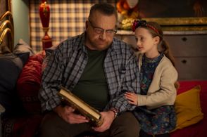 Mia McGovern Zaini and Tom Arnold in 