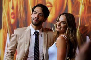 Margot Robbie and Diego Calva at an event for Babylon (2022)