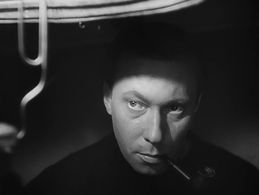 Carl Raddatz in Under the Bridges (1946)