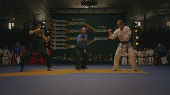 Hiro Koda, Tanner Buchanan, and Xolo Maridueña in Cobra Kai (2018)