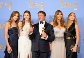 Sylvester Stallone, Jennifer Flavin, Sophia Rose Stallone, Sistine Rose Stallone, and Scarlet Rose Stallone at an event 
