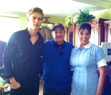 Austin Bulter as Sebastian Kydd, director David Paymer and Iliana Guibert as Rosa on the set of 