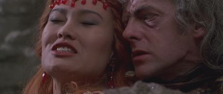 Tia Carrere and Edward Tudor-Pole in Kull the Conqueror (1997)