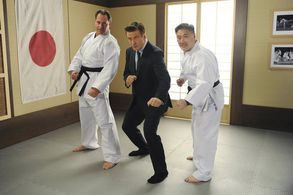 Alec Baldwin and Arnold Y. Kim in 30 Rock (2006)