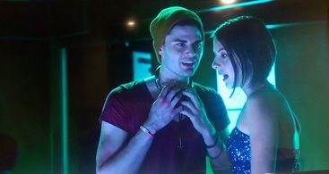 Joel Semande and Willa Holland in Arrow (2014).