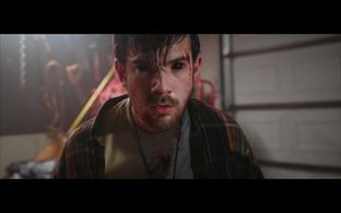 Noah Archibald in What Lies Within (2023)