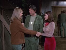 Alan Alda, Kathrine Baumann, and Sheila Lauritsen in M*A*S*H (1972)