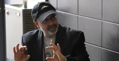 Behind the Scenes: Director Bryan W. Simon speaks with his camera crew.