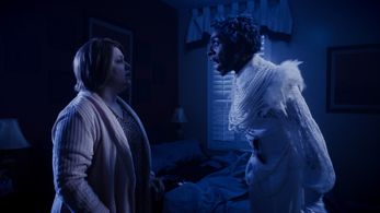 Michele Simms and Rolin Alexis in A Christmas Karen (2022)