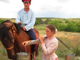 Evgeniy Tkachuk and Polina Chernyshova in And Quiet Flows the Don (2015)