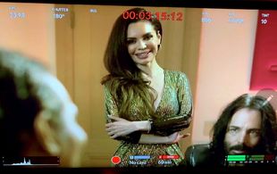 Still frame actress Brenda Mejia on set