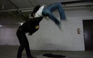 Yarettt Harper performing a wrestling stunt.