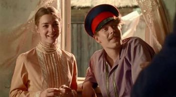 Nikita Efremov and Darya Ursulyak in And Quiet Flows the Don (2015)