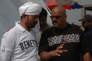 Action director Mahendra Verma working with director Puneet Sira on the set of Kisaan (2009)
