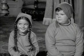 Lisa Loring and Ken Weatherwax in The Addams Family (1964)