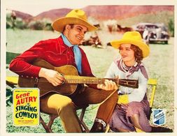 Gene Autry and Lois Wilde in The Singing Cowboy (1936)