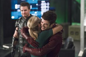 Stephen Amell, Grant Gustin, and Emily Bett Rickards in The Flash (2014)