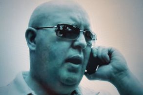 Steve McTigue playing Mark Clive in the TV Documentary Con Man Case Files (2011)