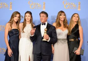 Sylvester Stallone, Jennifer Flavin, Sophia Rose Stallone, Sistine Rose Stallone, and Scarlet Rose Stallone at an event 
