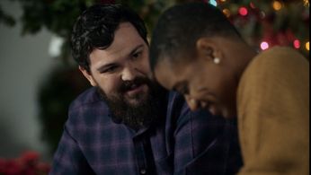Derek Johns and Benedicte Belizaire in A Candy Cane Christmas (2020)