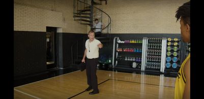 Michael Oilar as Coach Walker in 