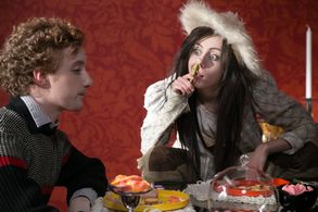 Steve (Michael William Hunter) being annoyed by his girlfriend, Aimy (Allisyn Ashley Arm) at the dinner table. (Photo fr