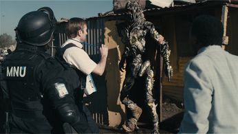 Sharlto Copley, Kenneth Nkosi, and Mandla Gaduka in District 9 (2009)
