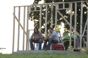 Taylor Kitsch and Derek Phillips in Friday Night Lights (2006)