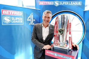 Adam Hills at an event for Channel 4: Super League (2022)